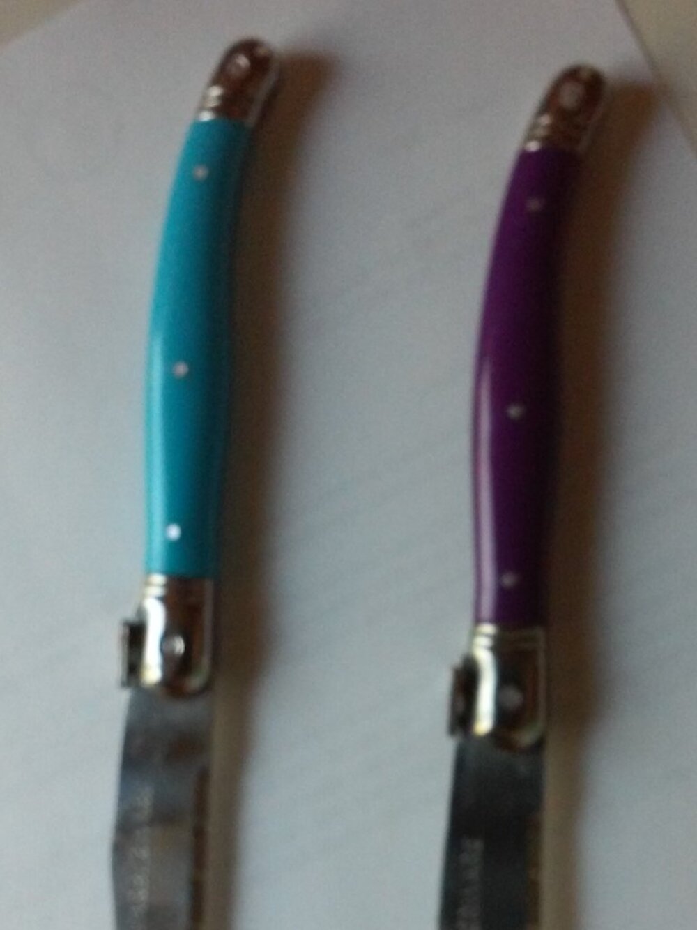 Farberware 2 Knives 9 " long Curved Handles and Thumb Rest Perfect Condition